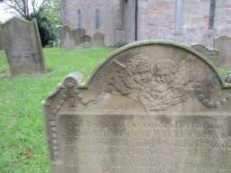 Imagery on the top of Raine Headstone at St James, Hamsterley August 2016